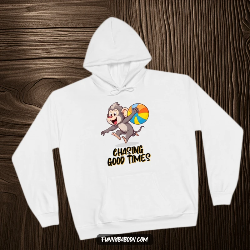 Funny Kawaii baboon hoodie, depicted leaping energetically after a colorful bouncing ball, combining warmth with primate action.